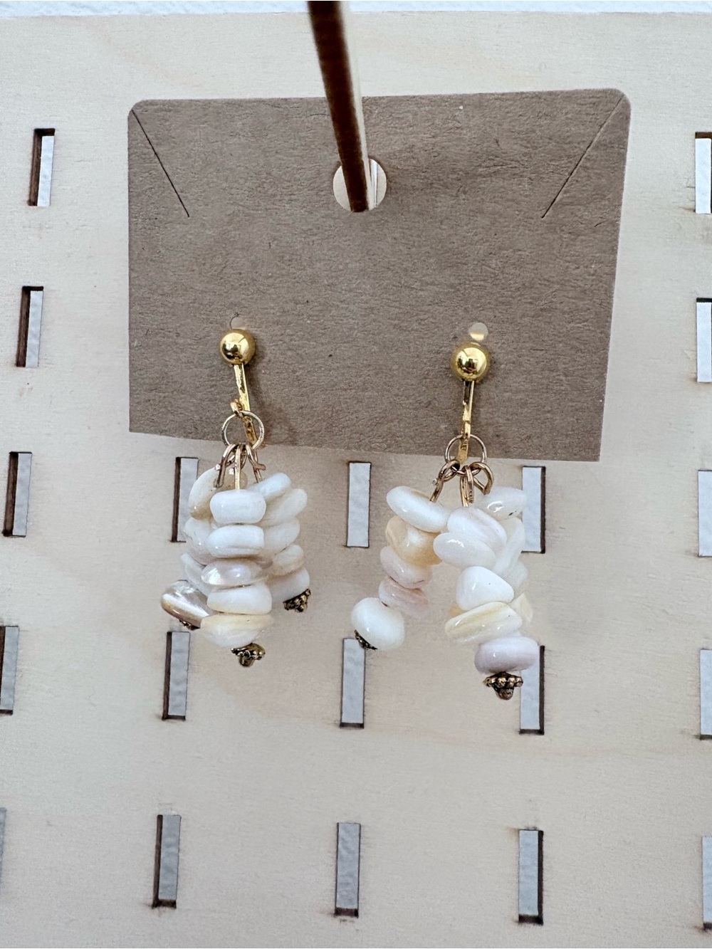 handcrafted off-white shell bead dangle clip on earrings